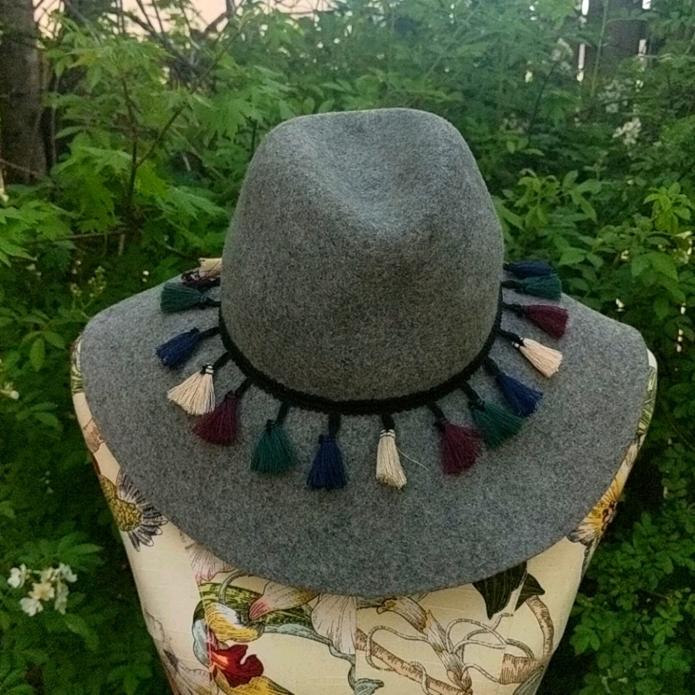 Adjustable 100% wool hat with tassels. Greenlabel